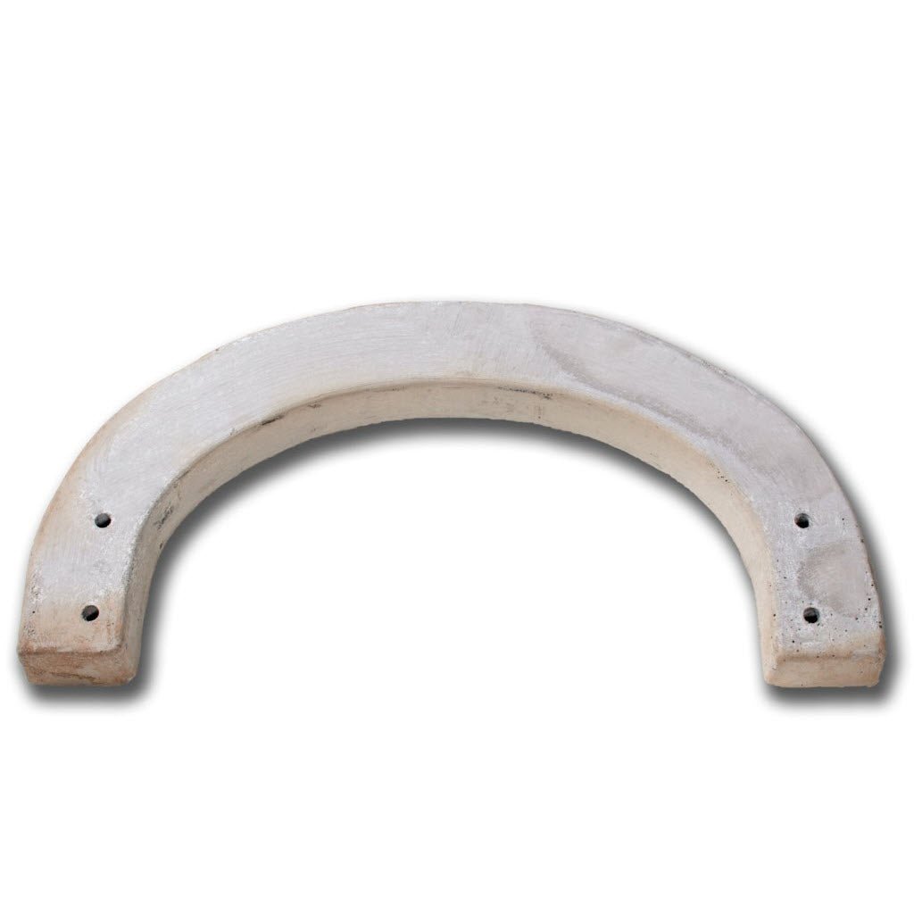The CBO-750 Arch by Chicago Brick Oven is a single, curved concrete block featuring a smooth, gray surface. This American-made block has four evenly spaced holes, two on each end, and stands out against the plain white background.