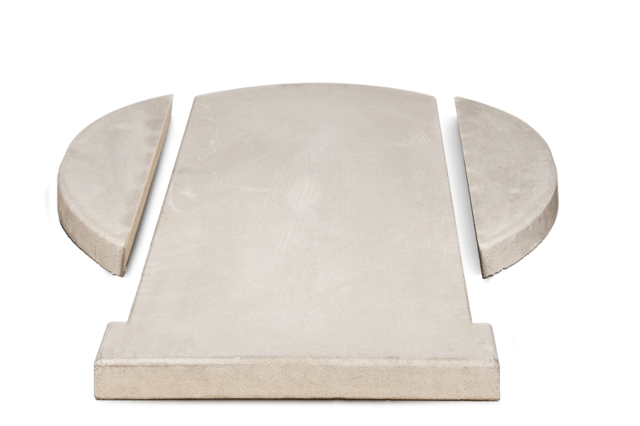 A concrete slab cut into three parts: one rectangular piece in the center and two semicircular pieces on either side. The light gray slab seems designed for specific fitting, potentially serving as a base for high-performance outdoor pizza ovens like the CBO 750 Tailgater from Chicago Brick Oven, which boasts a 38" X 28" cooking surface capable of baking 2-3 - 10" pizzas at a time or producing 50-60 pizzas an hour.