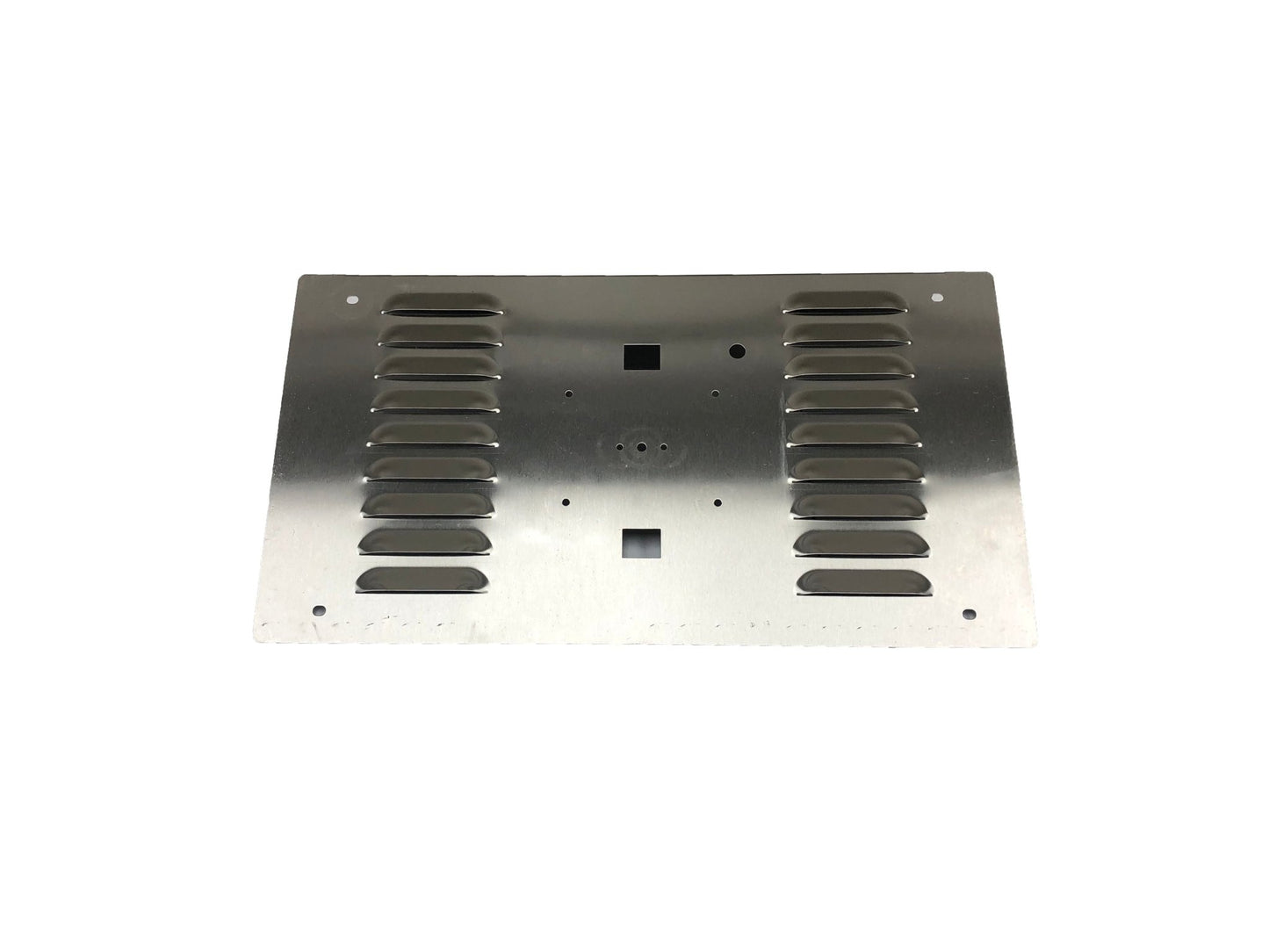 The Chicago Brick Oven SS Front Panel-Hybrid is a 22" x 12" rectangular stainless steel plate featuring symmetrical rows of rectangular ventilation slots on either side of its center. The front control panel includes small holes and cutouts, with a circular cluster in the middle, indicating it’s designed as a component for 750 hybrids or other mechanical/electronic devices.