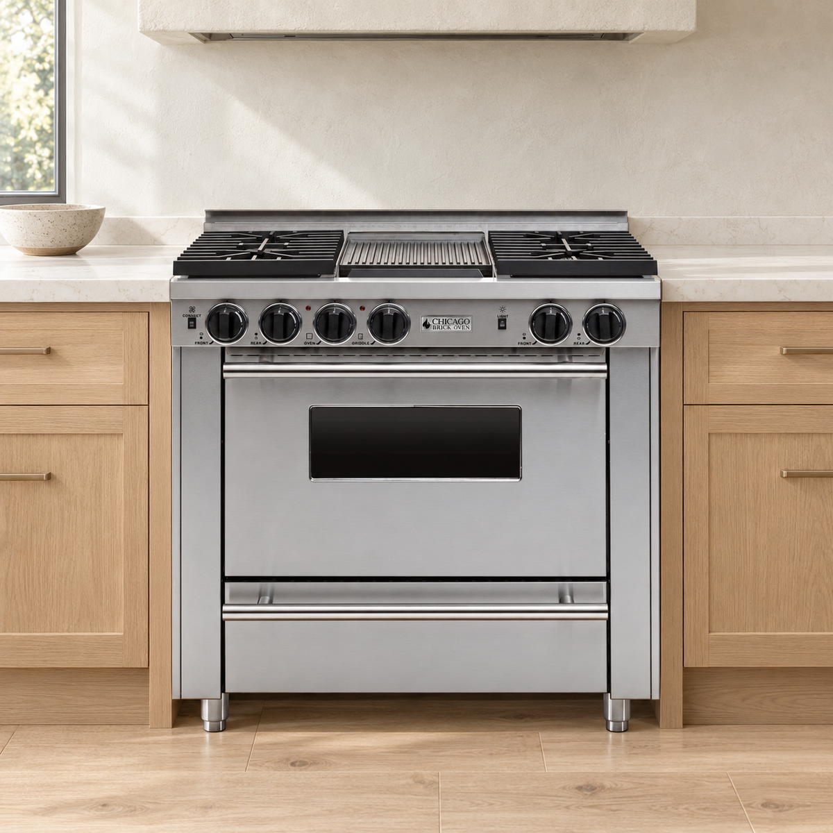 Light oak kitchen concept with the 36-inch stainless steel range, four sealed burners, center griddle and silver trim.