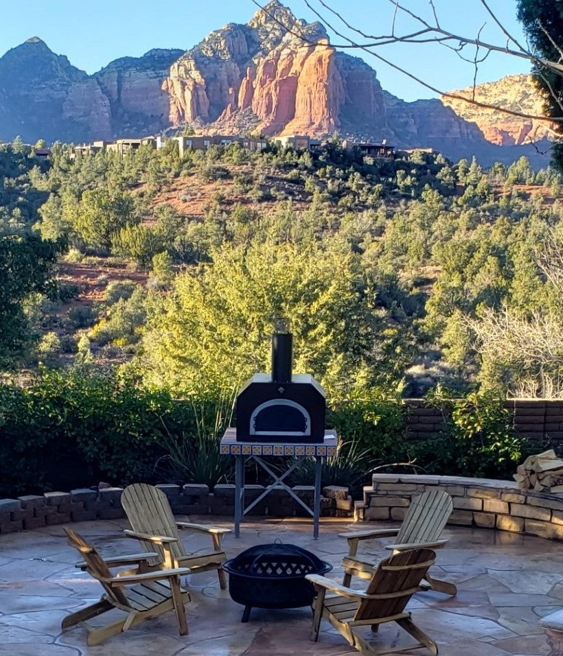 An assembled Chicago Brick Oven in an outdoor cooking space