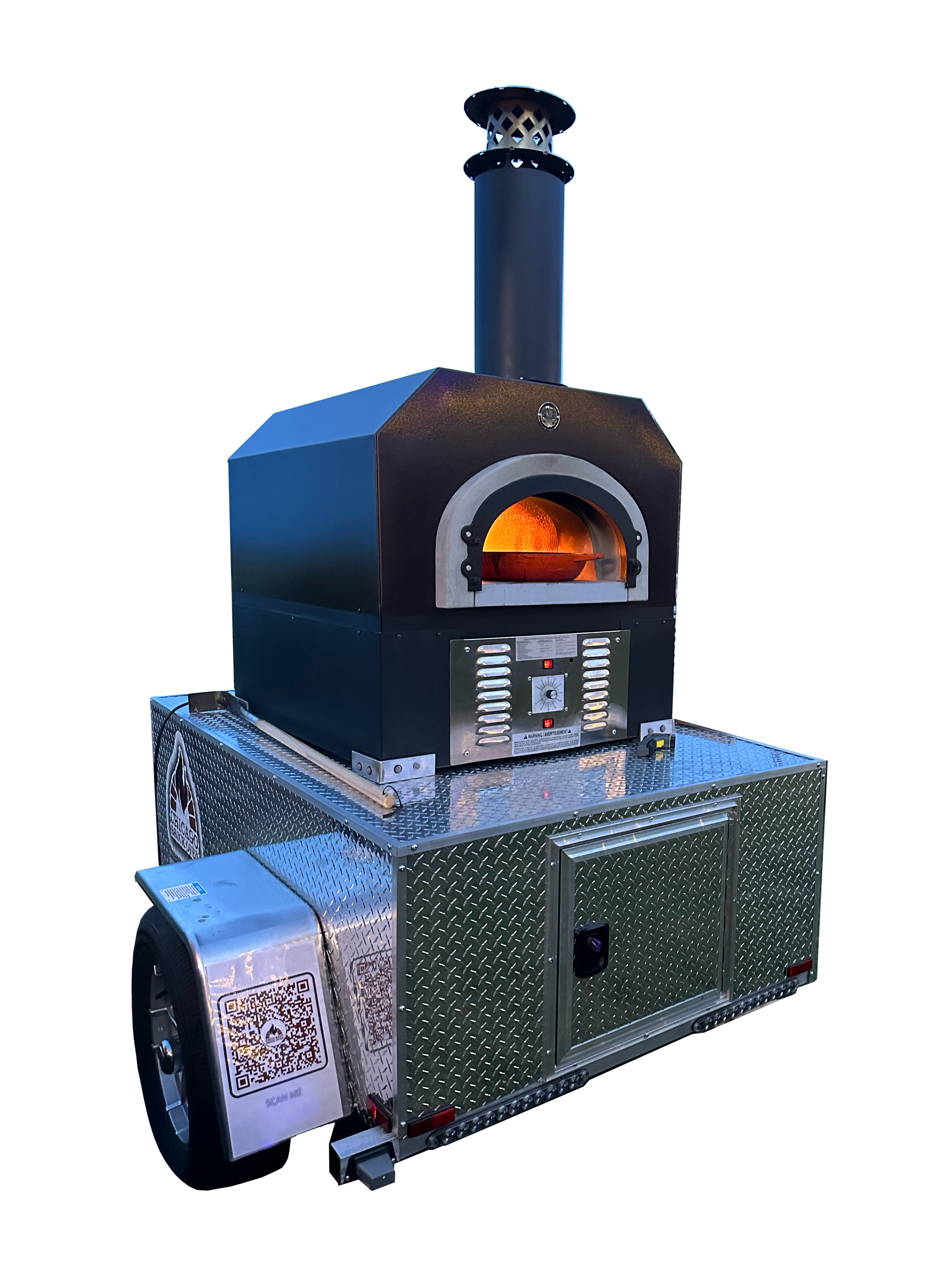 The CBO 750 Tailgater by Chicago Brick Oven is a mobile hybrid pizza oven trailer with diamond plate surfaces. This wood-fired and liquid propane oven, featuring a chimney on top, lights up with a visible flame inside. The trailer includes a storage compartment and QR code, all set against a sleek black background. It boasts a 38" X 28" cooking surface capable of making 2-3 pizzas at once and producing up to 50-60 pizzas an hour.