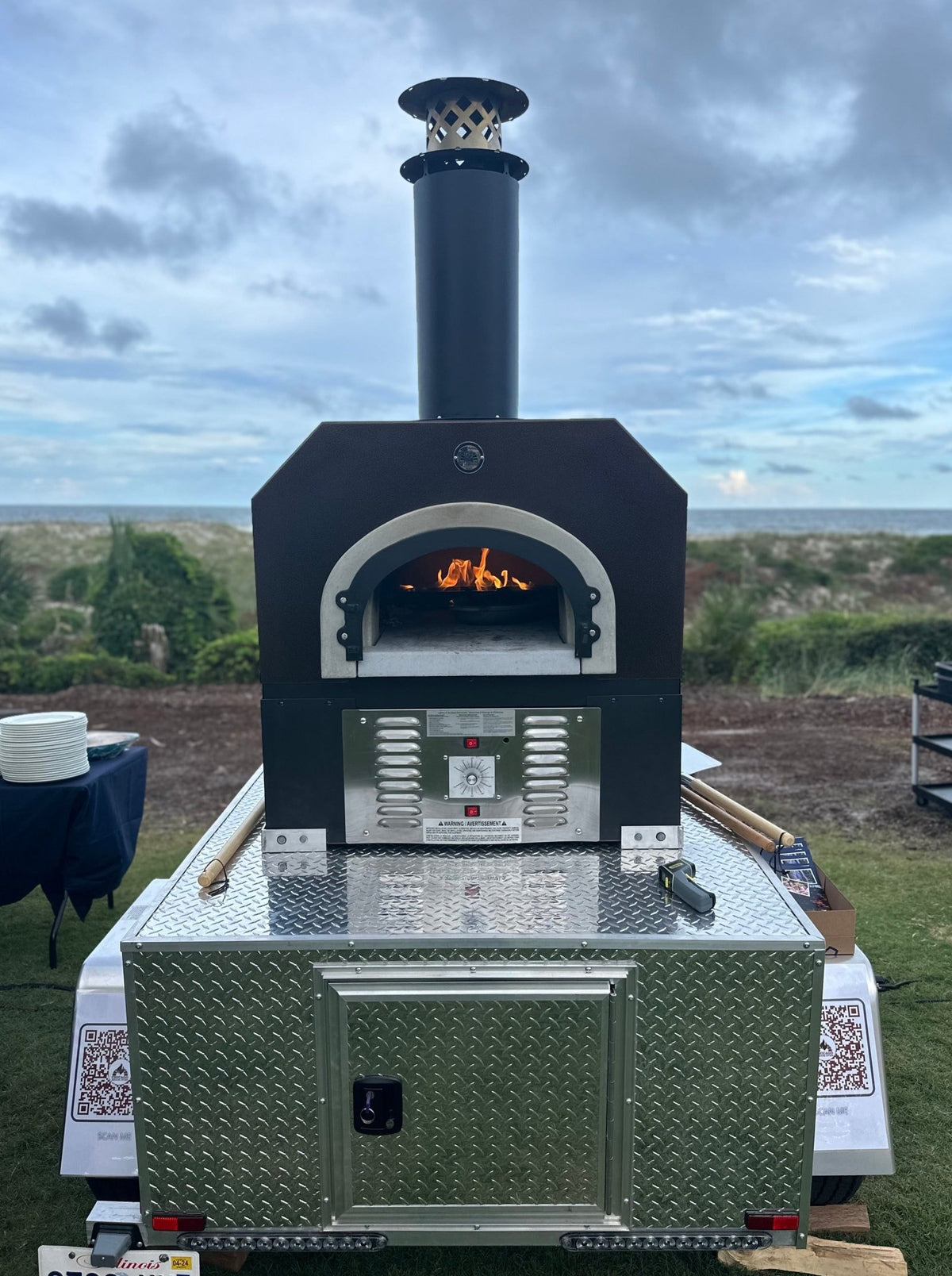LP Hybrid Tailgater · Solar Black shown · Cooking on location.