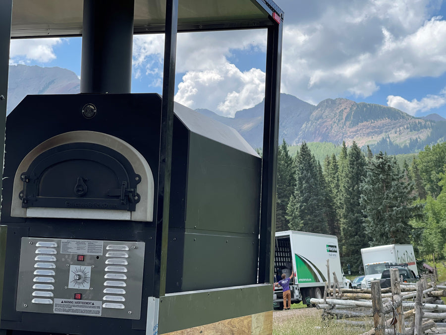 Chicago Brick Oven Hybrid installed in a catering trailer overlooking the mountains