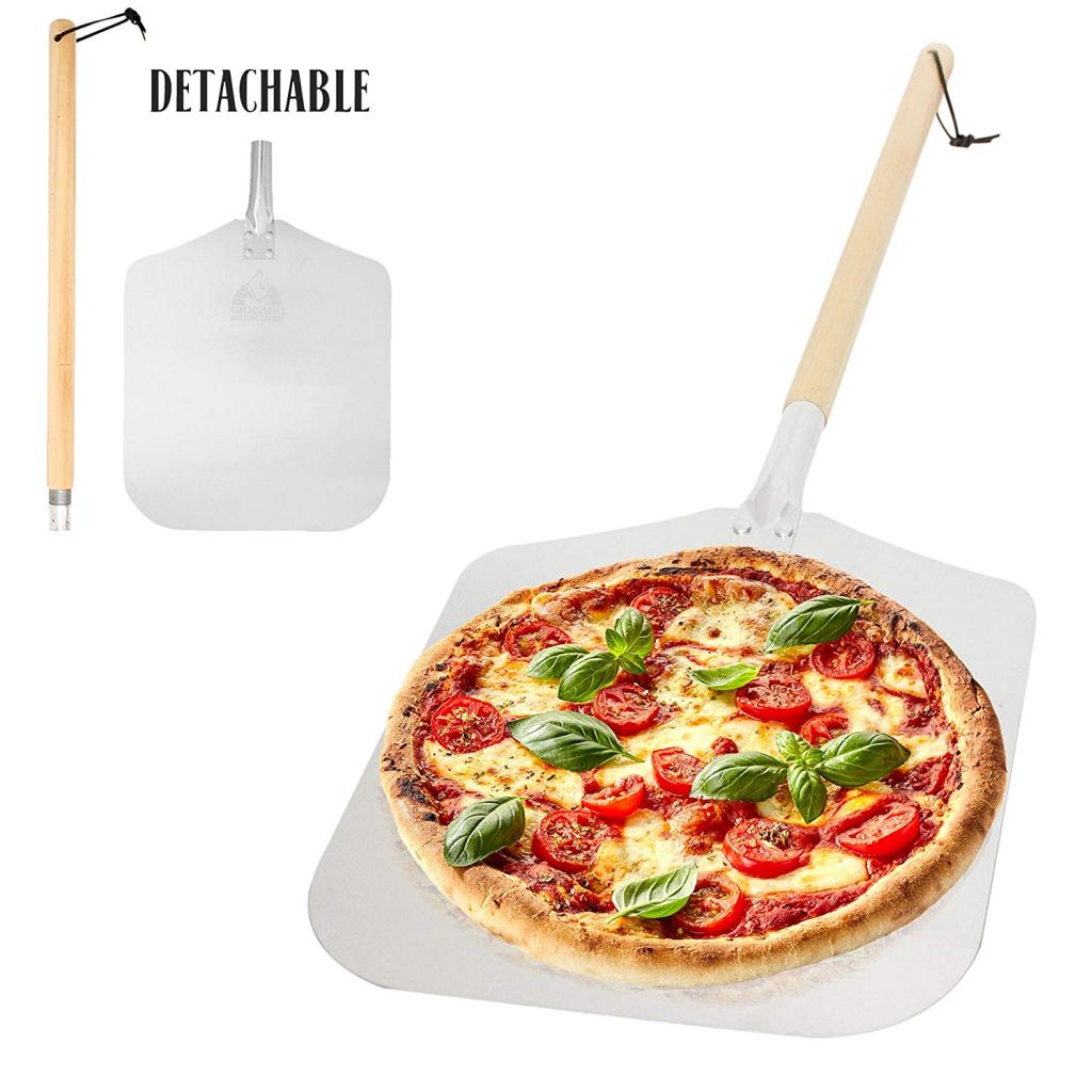 Featured in the image is the Chicago Brick Oven Pizza Peel 12" x 14", a 35.5" long aluminum metal pizza peel with a detachable 21" wooden handle, making it an ideal addition to your pizza oven accessories. The detachable handle allows for easy storage. A freshly cooked pizza topped with cheese, tomato slices, and basil leaves rests on the flat surface of the peel. An inset image showcases the pizza spatula separated from its handle.